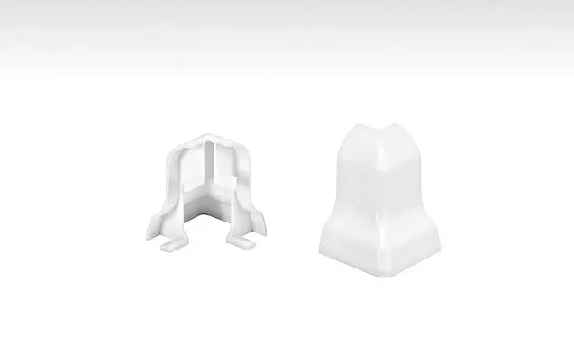 Neutralny biały narożnik zewnętrzny do profilowanej listwy przypodłogowej - Interio