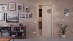 Zweites Milieubild mit in der Wand laufendem System von Eiche grau LA Bullauge Basic Durat Schiebetür - Huga