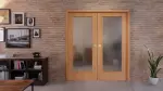 Front-Milieuansicht der in der Wand laufenden WESTAG Doppelflügel-Schiebetür Buche Blumig BU 88 PortaLit CPL mit Lichtausschnitt LA-1000