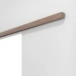 Detailansicht von Doppelflügel-Schiebetürsystem PortaLit Nussbaum Noce NU736 vor der Wand laufend ohne Zarge - Westag