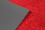 Detailansicht von Ober- und Untermaterial von Fußmatte ColourLine 040 hellrot - Entrada