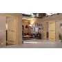 Main-Milieuansicht der vor Wand laufenden CLASSEN Schiebetür Greco M7 Eiche geölt 3D Look mit Lichtausschnitt