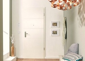 Białe drzwi wejściowe do mieszkania Jeld-Wen