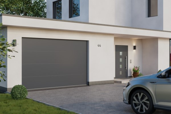Widok aranżacyjny antracytowej bramy garażowej